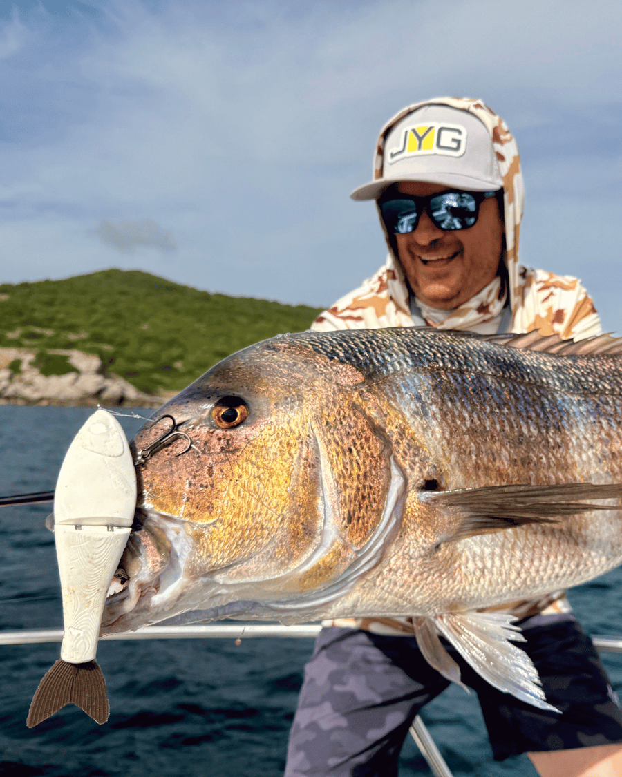  with a fish caught on a GLYDE