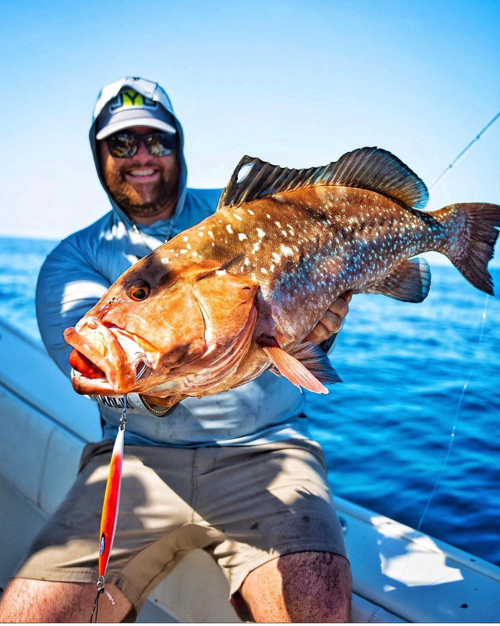 Red Grouper boatside after a deep-drop jig bite