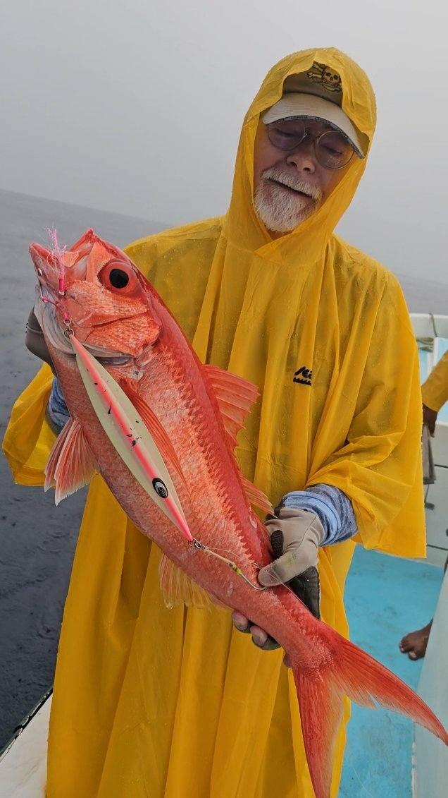 Angler holding a 42 inch snook caught on a GLYDE glide bait